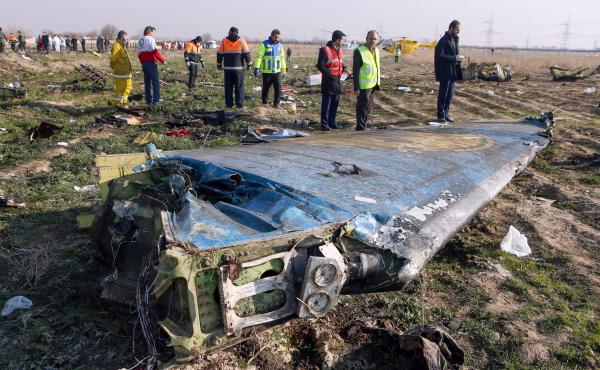 Rescue teams examine the wreckage of the Ukrainian airliner that was shot down shortly after takeoff in the Iranian capital, Tehran, on Jan. 8. Iran says a tragic series of mistakes led to the missile strike. Rescue teams examine the wreckage of the Ukrainian airliner that was shot down shortly after takeoff in the Iranian capital, Tehran, on Jan. 8. Iran says a tragic series of mistakes led to the missile strike.