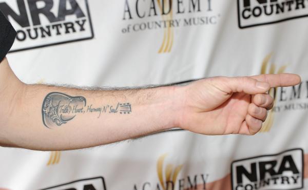 The tattoo of musician Josh Thompson, photographed while attending the NRA Country/ACM Celebrity Shoot hosted by Blake Shelton at Nellis Air Force Base on April 2, 2011 in Las Vegas, Nevada. The tattoo of musician Josh Thompson, photographed while attending the NRA Country/ACM Celebrity Shoot hosted by Blake Shelton at Nellis Air Force Base on April 2, 2011 in Las Vegas, Nevada.