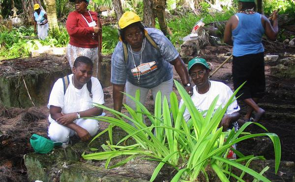 Chagossians weep at the grave of their parents on Peros Banos Island April 10, 2006. Fifteen elders are allowed to visit once a year. Chagossians weep at the grave of their parents on Peros Banos Island April 10, 2006. Fifteen elders are allowed to visit once a year.
