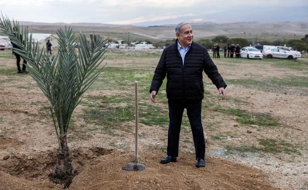 Israeli Prime Minister Benjamin Netanyahu plants a tree during a commemoration of the Jewish holiday of Tu BiShvat (New Year for Trees), in the Israeli settlement of Mevo'ot Yericho near the Palestinian city of Jericho in the Jordan Valley in the occupied Israeli Prime Minister Benjamin Netanyahu plants a tree during a commemoration of the Jewish holiday of Tu BiShvat (New Year for Trees), in the Israeli settlement of Mevo'ot Yericho near the Palestinian city of Jericho in the Jordan Valley in the occupied