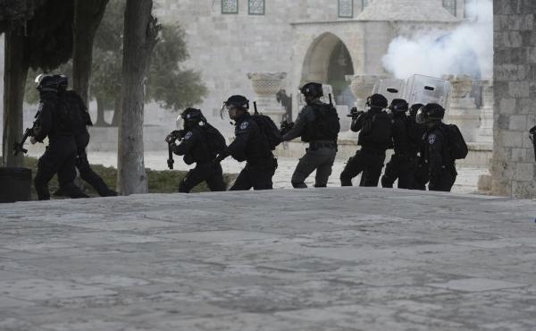 Israeli police clash with Palestinian protesters at the Al Aqsa Mosque compound in Jerusalem's Old City, Friday, April 22, 2022. Israeli police clash with Palestinian protesters at the Al Aqsa Mosque compound in Jerusalem's Old City, Friday, April 22, 2022.