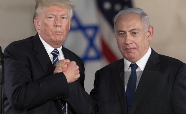 President Trump and Israeli Prime Minister Benjamin Netanyahu shake hands in Jerusalem in May. Some critics say Netanyahu responded cautiously to the Charlottesville rally because he wanted to avoid angering Trump. President Trump and Israeli Prime Minister Benjamin Netanyahu shake hands in Jerusalem in May. Some critics say Netanyahu responded cautiously to the Charlottesville rally because he wanted to avoid angering Trump.