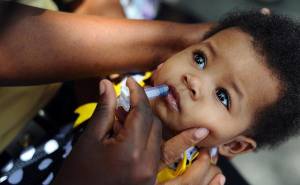 A nurse administers the rotavirus vaccine, given during the first year of a baby's life. A nurse administers the rotavirus vaccine, given during the first year of a baby's life.