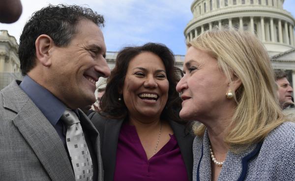 Rep.-elect Andy Levin, D-Mich. (left); Rep.-elect Veronica Escobar, D-Texas (center); and Rep.-elect Sylvia Garcia, D-Texas, talk following a photo of the incoming members of Congress on Capitol Hill on Wednesday. Rep.-elect Andy Levin, D-Mich. (left); Rep.-elect Veronica Escobar, D-Texas (center); and Rep.-elect Sylvia Garcia, D-Texas, talk following a photo of the incoming members of Congress on Capitol Hill on Wednesday.
