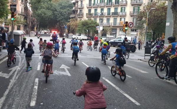 Children joining the bicibús in the Eixample district of Barcelona, Spain, make their way to school on a recent Friday morning. The community is hoping to build a school-friendly bike lane for a safer commute for kids. Children joining the bicibús in the Eixample district of Barcelona, Spain, make their way to school on a recent Friday morning. The community is hoping to build a school-friendly bike lane for a safer commute for kids.