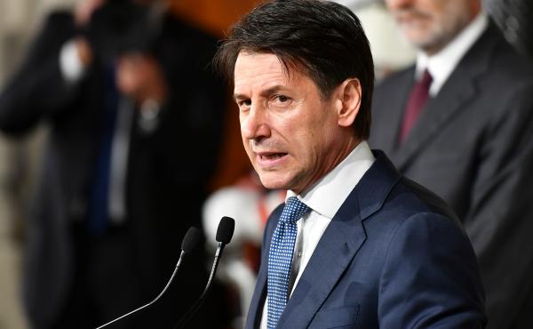 Giuseppe Conte addresses the media after a meeting Wednesday with Italian President Sergio Mattarella at the presidential palace in Rome. Mattarella approved the lawyer's nomination to serve as prime minister. Giuseppe Conte addresses the media after a meeting Wednesday with Italian President Sergio Mattarella at the presidential palace in Rome. Mattarella approved the lawyer's nomination to serve as prime minister.