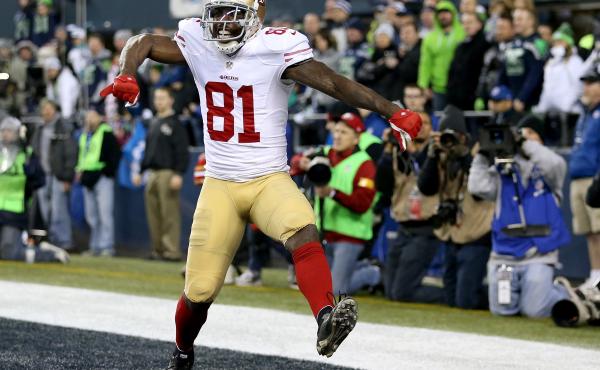 Former San Francisco 49ers wide receiver Anquan Boldin celebrates scoring a touchdown during the 2014 NFC Championship. Former San Francisco 49ers wide receiver Anquan Boldin celebrates scoring a touchdown during the 2014 NFC Championship.