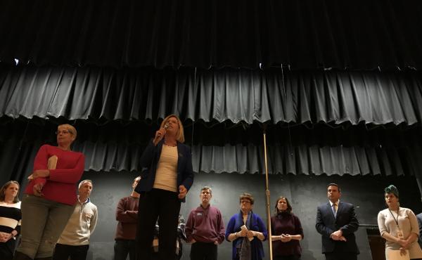 Democratic gubernatorial candidate Andy McGuire pitches herself to caucus-goers in the Roosevelt High School Auditorium in Des Moines during the Iowa Caucuses on Feb. 5, 2018. Democratic gubernatorial candidate Andy McGuire pitches herself to caucus-goers in the Roosevelt High School Auditorium in Des Moines during the Iowa Caucuses on Feb. 5, 2018.