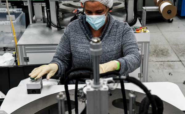 An employee makes respiratory masks in a family-owned medical equipment factory in Miami on Feb. 15. American manufacturers are thriving but they are running into an unexpected problem: finding critical supplies. An employee makes respiratory masks in a family-owned medical equipment factory in Miami on Feb. 15. American manufacturers are thriving but they are running into an unexpected problem: finding critical supplies.