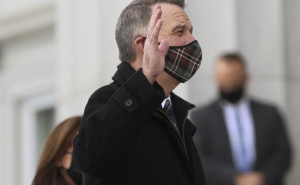 Thursday, Jan. 7, 2021, Republican Gov. Phil Scott wears a mask as he takes the Oath of Office on the steps of the Vermont Statehouse in Montpelier, Vt., beginning his third two-year term. Vermont is one of two states that holds elections for governor eve Thursday, Jan. 7, 2021, Republican Gov. Phil Scott wears a mask as he takes the Oath of Office on the steps of the Vermont Statehouse in Montpelier, Vt., beginning his third two-year term. Vermont is one of two states that holds elections for governor eve