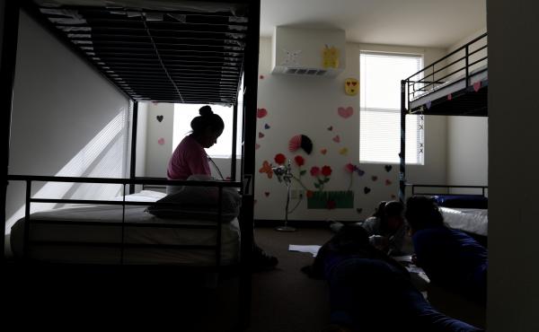 A holding center for migrant children in Carrizo Springs, Texas. A 16-year-old Honduran boy who entered the U.S. alone was scheduled to be deported Wednesday, but a federal judge has blocked his removal. A holding center for migrant children in Carrizo Springs, Texas. A 16-year-old Honduran boy who entered the U.S. alone was scheduled to be deported Wednesday, but a federal judge has blocked his removal.