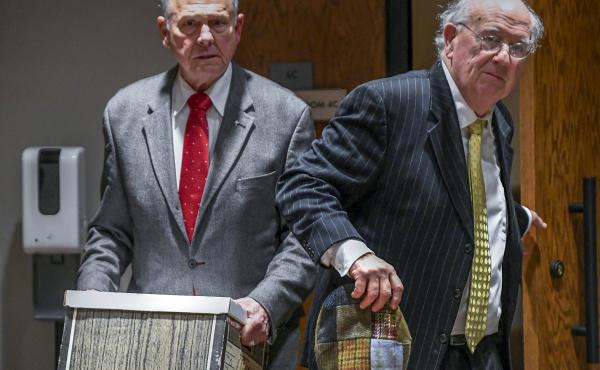 Former Alabama Chief Justice Roy Moore, left, and his attorney Julian McPhillips leave the courtroom in the Montgomery County Courthouse in Montgomery, Ala., on Jan. 24 following jury selection. Former Alabama Chief Justice Roy Moore, left, and his attorney Julian McPhillips leave the courtroom in the Montgomery County Courthouse in Montgomery, Ala., on Jan. 24 following jury selection.