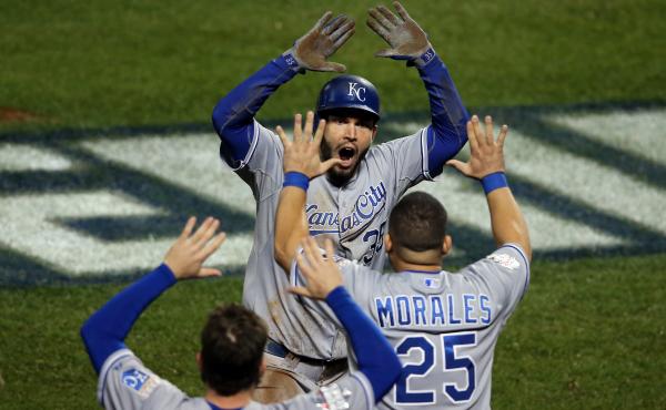 Eric Hosmer of the Kansas City Royals celebrates with his teammates after scoring a run to tie the game in the ninth inning against the New York Mets during Game 5 of the 2015 World Series. Eric Hosmer of the Kansas City Royals celebrates with his teammates after scoring a run to tie the game in the ninth inning against the New York Mets during Game 5 of the 2015 World Series.