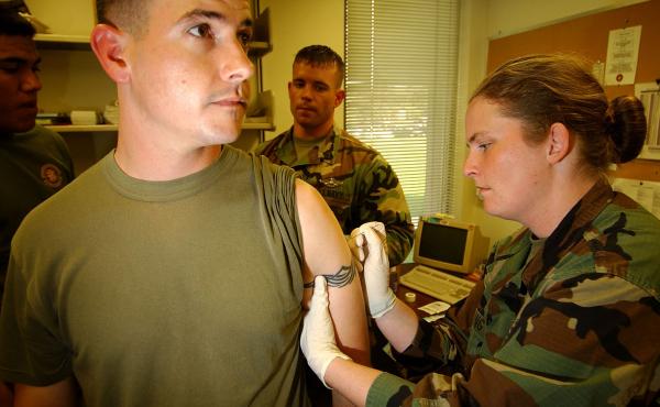 U.S. Marine Sgt. Robert Scoggin gets a vaccination against smallpox in 2003 at Camp Pendleton in California — one of the final steps before deployment overseas. U.S. Marine Sgt. Robert Scoggin gets a vaccination against smallpox in 2003 at Camp Pendleton in California — one of the final steps before deployment overseas.