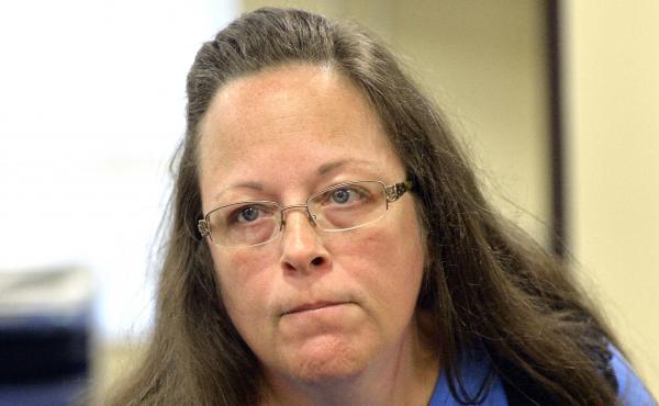 A federal judge on Friday ordered Kentucky taxpayers to pay more than $220,000 in attorney fees for same-sex couples and others who sued Rowan County Clerk Kim Davis for refusing to issue marriage licenses. A federal judge on Friday ordered Kentucky taxpayers to pay more than $220,000 in attorney fees for same-sex couples and others who sued Rowan County Clerk Kim Davis for refusing to issue marriage licenses.