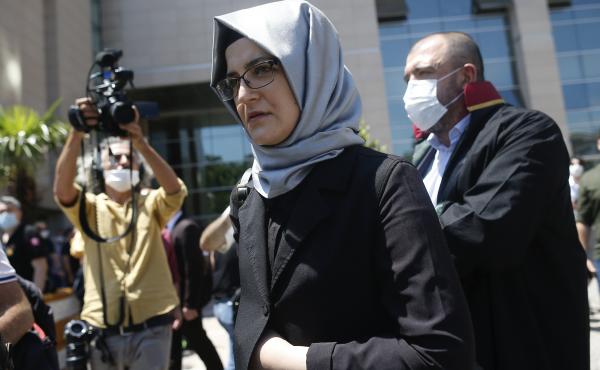 Hatice Cengiz, who was engaged to slain Saudi journalist Jamal Kashoggi, leaves a court in Istanbul on Friday. Two former aides to Saudi Crown Prince Mohammed bin Salman and 18 other Saudi nationals are on trial in absentia over the 2018 killing of the Wa Hatice Cengiz, who was engaged to slain Saudi journalist Jamal Kashoggi, leaves a court in Istanbul on Friday. Two former aides to Saudi Crown Prince Mohammed bin Salman and 18 other Saudi nationals are on trial in absentia over the 2018 killing of the Wa