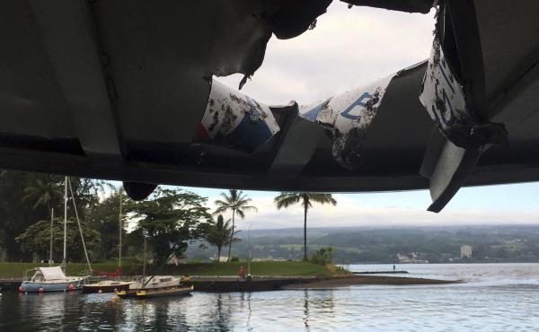 A tour boat was damaged and 23 people injured when lava crashed through the roof of the vessel off the Big Island of Hawaii Monday. A tour boat was damaged and 23 people injured when lava crashed through the roof of the vessel off the Big Island of Hawaii Monday.