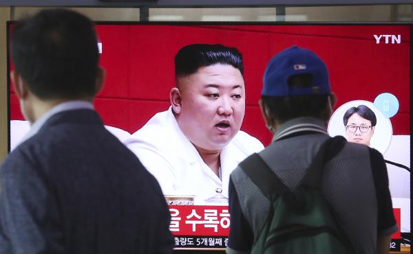 People at the Seoul Railway Station in Seoul watch a news program Friday showing a file image of North Korean leader Kim Jong Un, who said he was sorry over the killing of a South Korean fisheries official near the two countries' disputed sea boundary. People at the Seoul Railway Station in Seoul watch a news program Friday showing a file image of North Korean leader Kim Jong Un, who said he was sorry over the killing of a South Korean fisheries official near the two countries' disputed sea boundary.