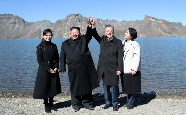 South Korean President Moon Jae-in, first lady Kim Jung-sook, North Korean leader Kim Jong Un and his wife Ri Sol Ju pose for beside the Heaven Lake of Mount Paektu, North Korea, Sept. 20. South Korean President Moon Jae-in, first lady Kim Jung-sook, North Korean leader Kim Jong Un and his wife Ri Sol Ju pose for beside the Heaven Lake of Mount Paektu, North Korea, Sept. 20.