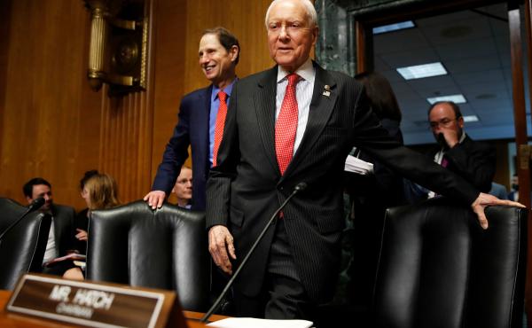 Senate Finance Committee Chairman Orrin Hatch, R-Utah, center, and ranking member Ron Wyden, D-Ore., have a plan to renew funding for the Children's Health Insurance Program, which lapsed Sept. 30. Senate Finance Committee Chairman Orrin Hatch, R-Utah, center, and ranking member Ron Wyden, D-Ore., have a plan to renew funding for the Children's Health Insurance Program, which lapsed Sept. 30.