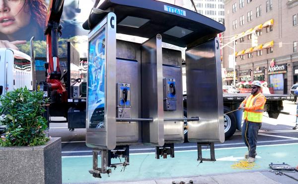 Workers remove the final New York City pay phone near Seventh Avenue and 50th Street in Midtown Manhattan on Monday. Despite the fanfare, there are still some pay phones standing in the city. Workers remove the final New York City pay phone near Seventh Avenue and 50th Street in Midtown Manhattan on Monday. Despite the fanfare, there are still some pay phones standing in the city.