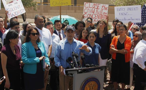 Rep. Joaquin Castro, D-Texas, speaks alongside members of the Hispanic Caucus after touring the Border Patrol station in Clint, Texas, on Monday. Rep. Joaquin Castro, D-Texas, speaks alongside members of the Hispanic Caucus after touring the Border Patrol station in Clint, Texas, on Monday.