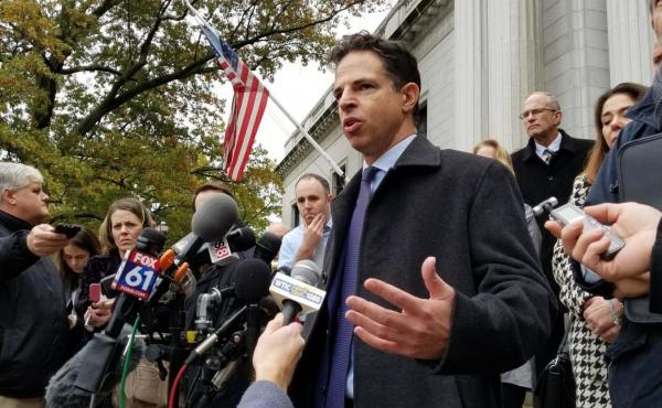 Josh Koskoff, a lawyer representing the families of Sandy Hook shooting victims, speaks outside the Connecticut Supreme Court in this file photo from 2017. Josh Koskoff, a lawyer representing the families of Sandy Hook shooting victims, speaks outside the Connecticut Supreme Court in this file photo from 2017.