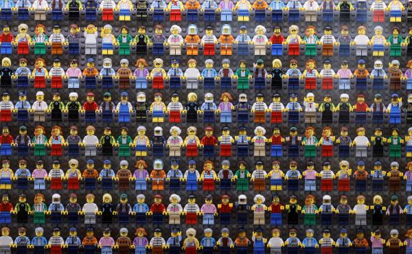 A wall of Lego minifigures is encased inside the lobby of the Legoland Hotel in Goshen, N.Y. on Aug. 6. The Danish company is pledging to remove harmful stereotypes from its products and marketing. A wall of Lego minifigures is encased inside the lobby of the Legoland Hotel in Goshen, N.Y. on Aug. 6. The Danish company is pledging to remove harmful stereotypes from its products and marketing.