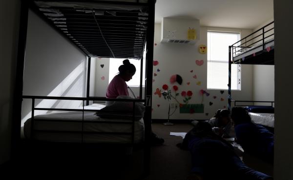 When children are held for long periods away in detention centers, such as this center for migrant children in Carrizo Springs, Texas, they may suffer psychological harm. When children are held for long periods away in detention centers, such as this center for migrant children in Carrizo Springs, Texas, they may suffer psychological harm.