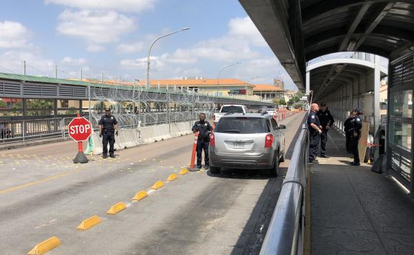 Gateway to the Americas Bridge connecting Laredo, Texas and Nuevo Laredo, Tamaulipas, Mexico, has been nearly empty. On a normal day, about 10,000 people cross from Nuevo Laredo into Laredo. This week, it's barely a trickle. Gateway to the Americas Bridge connecting Laredo, Texas and Nuevo Laredo, Tamaulipas, Mexico, has been nearly empty. On a normal day, about 10,000 people cross from Nuevo Laredo into Laredo. This week, it's barely a trickle.