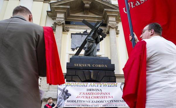 Catholics gathered in front of Warsaw's church of Holy Cross in an anti-LGBT protest in May. Catholics gathered in front of Warsaw's church of Holy Cross in an anti-LGBT protest in May.