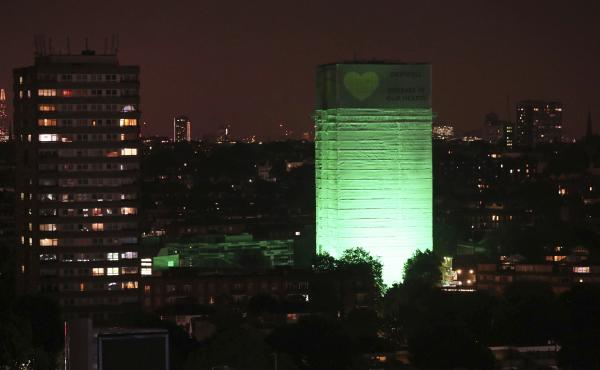 Grenfell Tower in west London is illuminated in green to mark a year since the devastating fire claimed 72 lives. Grenfell Tower in west London is illuminated in green to mark a year since the devastating fire claimed 72 lives.