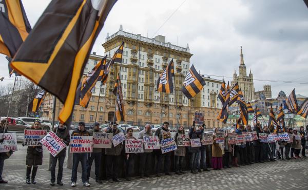 Russian demonstrators hold anti-American posters outside the U.S. Embassy in 2015. From the 1960s through the 1980s, the U.S. said the Soviet Union beamed microwave signals at the U.S. Embassy in an attempt to collect intelligence. Russian demonstrators hold anti-American posters outside the U.S. Embassy in 2015. From the 1960s through the 1980s, the U.S. said the Soviet Union beamed microwave signals at the U.S. Embassy in an attempt to collect intelligence.