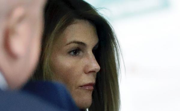 Loughlin enters a federal court hearing in the college admissions bribery case in August 2019 in Boston. Loughlin enters a federal court hearing in the college admissions bribery case in August 2019 in Boston.