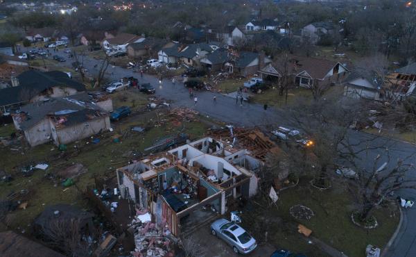 Debris litters the ground surrounding homes, damaged by a tornado in Round Rock, Texas, on Monday. Debris litters the ground surrounding homes, damaged by a tornado in Round Rock, Texas, on Monday.