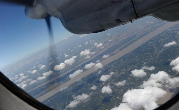 A Vietnamese Air Force plane returns from a search operation over Vietnam's southern sea. A Vietnamese Air Force plane returns from a search operation over Vietnam's southern sea.