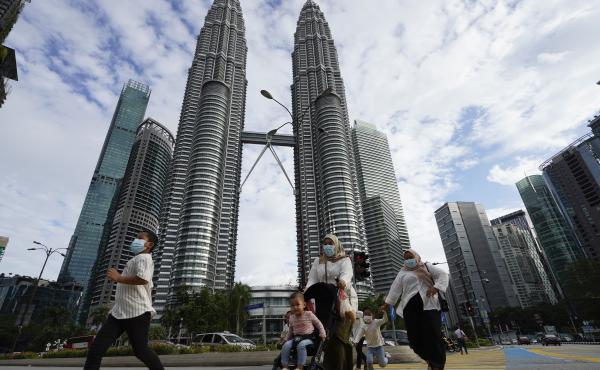 Malaysia's king suspended the national parliament and state legislatures for an unspecified period of time under the nation's new virus restrictions. Malaysia's king suspended the national parliament and state legislatures for an unspecified period of time under the nation's new virus restrictions.