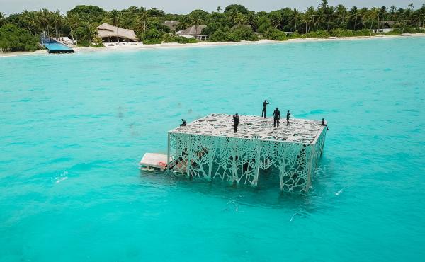British artist Jason deCaires Taylor's Coralarium sits in waters off the Maldives. British artist Jason deCaires Taylor's Coralarium sits in waters off the Maldives.