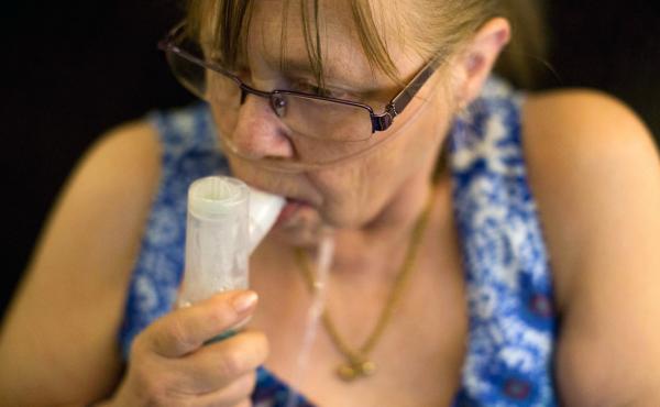 Juanita Milton, who suffers from COPD, uses her nebulizer with albuterol sulfate at her home in Live Oak, Texas. Juanita Milton, who suffers from COPD, uses her nebulizer with albuterol sulfate at her home in Live Oak, Texas.
