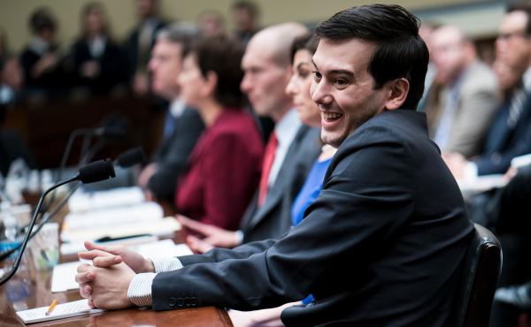 Entrepreneur and pharmaceutical executive Martin Shkreli laughs during a hearing of the House Oversight and Government Reform Committee on Capitol Hill on Thursday. Entrepreneur and pharmaceutical executive Martin Shkreli laughs during a hearing of the House Oversight and Government Reform Committee on Capitol Hill on Thursday.