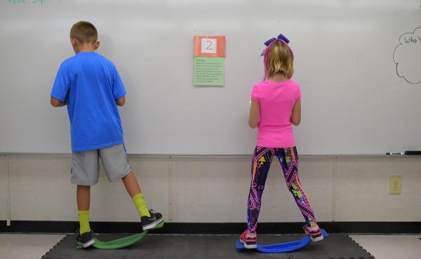 Two fourth-graders rock side to side while doing math equations at Charles Pinckney Elementary School's "Brain Room" in Charleston, S.C., in 2015. Two fourth-graders rock side to side while doing math equations at Charles Pinckney Elementary School's "Brain Room" in Charleston, S.C., in 2015.