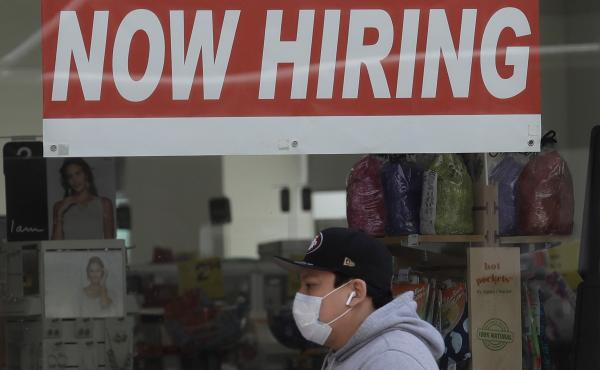 A man walks by a CVS Pharmacy in San Francisco on May 7. U.S. employers unexpectedly added jobs last month as the unemployment rate fell. A man walks by a CVS Pharmacy in San Francisco on May 7. U.S. employers unexpectedly added jobs last month as the unemployment rate fell.