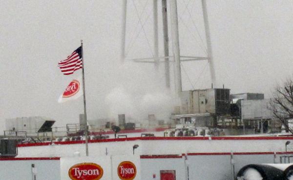 Tyson Foods says it has suspended operations at its pork plant in Columbus Junction, Iowa, pictured in February 2013, after more than two dozen workers got sick with COVID-19. Tyson Foods says it has suspended operations at its pork plant in Columbus Junction, Iowa, pictured in February 2013, after more than two dozen workers got sick with COVID-19.