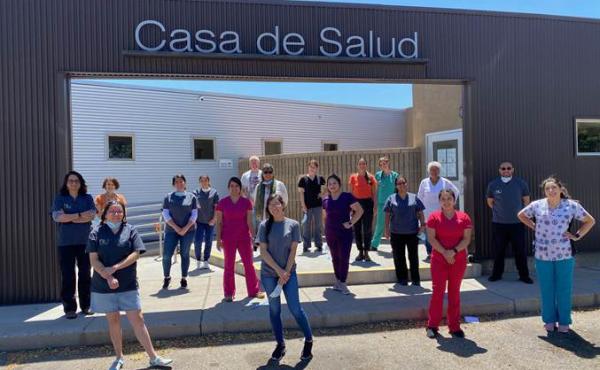 Casa de Salud clinicians, staff and health apprentices socially distance outside their New Mexico clinic. The facility is one of many social safety net clinics that haven't yet received pandemic-related funding and are now on the brink financially. Casa de Salud clinicians, staff and health apprentices socially distance outside their New Mexico clinic. The facility is one of many social safety net clinics that haven't yet received pandemic-related funding and are now on the brink financially.