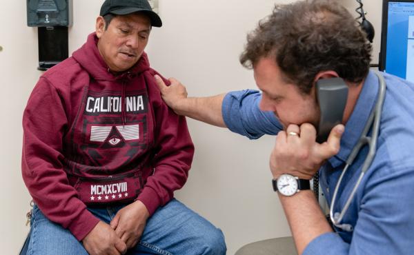 Juan Lopez Aguilar (left), a Maya man who fled violence in Guatemala three years ago, tells Dr. Nick Nelson he fears returning to the land of his birth. "There are a lot of gangs," he tells the doctor. "They want to kill people in my community." Juan Lopez Aguilar (left), a Maya man who fled violence in Guatemala three years ago, tells Dr. Nick Nelson he fears returning to the land of his birth. "There are a lot of gangs," he tells the doctor. "They want to kill people in my community."