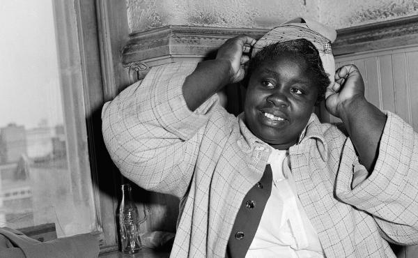 Georgia Gilmore adjusts her hat for photographers in 1956 during the bus boycott trial of Rev. Martin Luther King Jr. in Montgomery, Ala. She testified: "When you pay your fare and they count the money, they don't know the Negro money from white money." Georgia Gilmore adjusts her hat for photographers in 1956 during the bus boycott trial of Rev. Martin Luther King Jr. in Montgomery, Ala. She testified: "When you pay your fare and they count the money, they don't know the Negro money from white money."