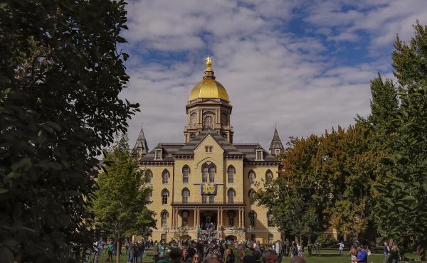 The University of Notre Dame, pictured in Sept. 2018, is one of two universities announcing a step back from in-person learning on Tuesday. It is going remote for two weeks, while Michigan State University will be online-only for the fall semester. The University of Notre Dame, pictured in Sept. 2018, is one of two universities announcing a step back from in-person learning on Tuesday. It is going remote for two weeks, while Michigan State University will be online-only for the fall semester.