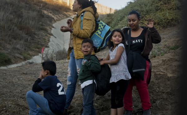 Honduran migrants surrender to the U.S. Border Patrol after crossing a border wall into the United States. According to new federal data, the number of migrants apprehended crossing the border in recent months has surged. Honduran migrants surrender to the U.S. Border Patrol after crossing a border wall into the United States. According to new federal data, the number of migrants apprehended crossing the border in recent months has surged.