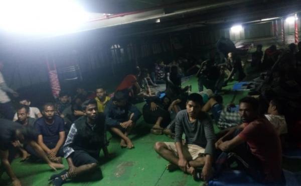 A photo provided Nov. 14 shows migrants on board the container ship Nivin, which rescued more than 90 migrants from a raft in the Mediterranean more than a week ago. Many of those migrants refused to disembark in Libya; they were forcibly removed from the A photo provided Nov. 14 shows migrants on board the container ship Nivin, which rescued more than 90 migrants from a raft in the Mediterranean more than a week ago. Many of those migrants refused to disembark in Libya; they were forcibly removed from the
