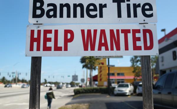 A "Help Wanted" sign is posted in front of a business on Feb. 4 in Miami. Although millions are unemployed, some businesses that require being on-site are struggling to find workers. A "Help Wanted" sign is posted in front of a business on Feb. 4 in Miami. Although millions are unemployed, some businesses that require being on-site are struggling to find workers.